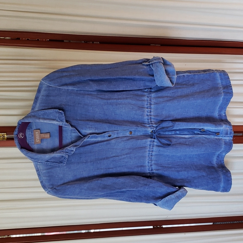 Chico's blue cotton jacket. Button front and roll sleeves. Tie waist. Size 2.